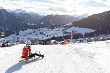 SFL Rodelbahn Fiss mit Dorfblick